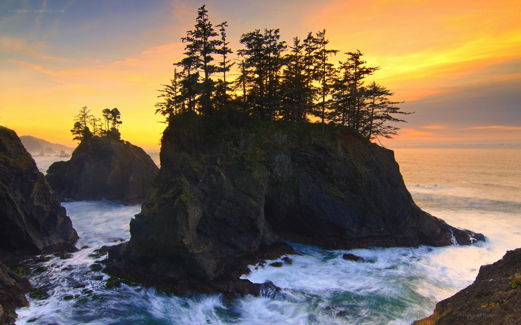 Sunset over coastal rock formations