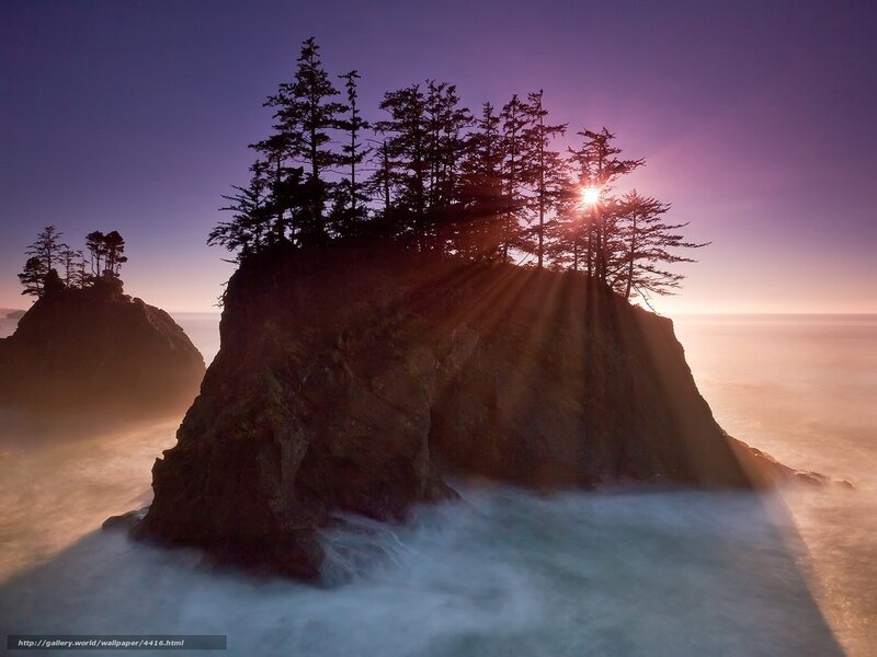 Sunset over coastal rock formations