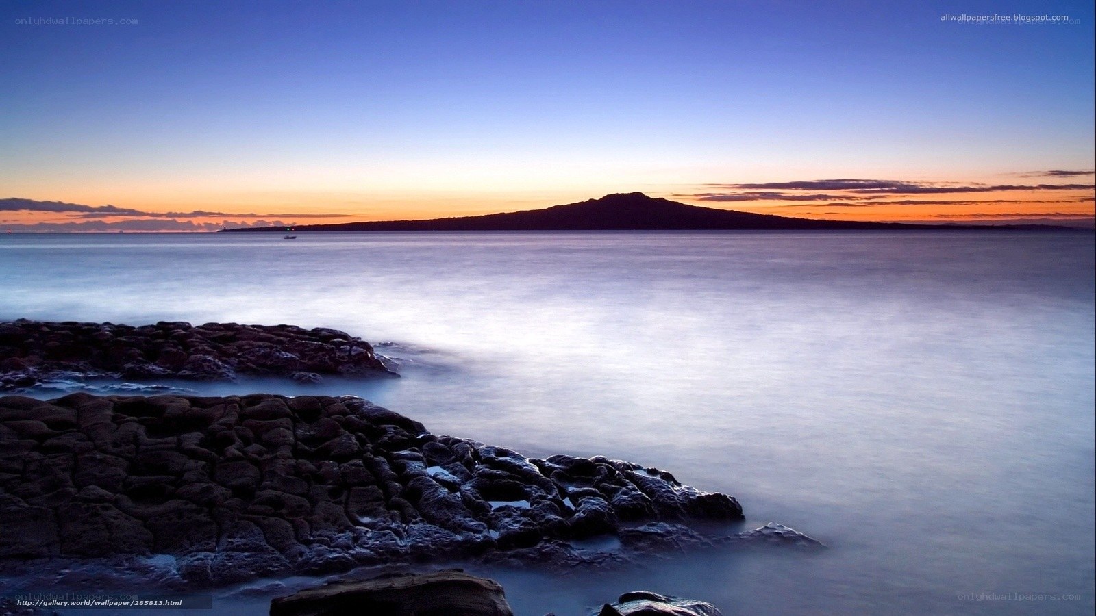 Sunset over coastal rocks