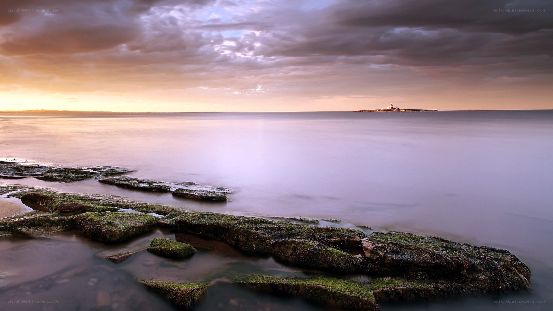 Sunset over coastal rocks