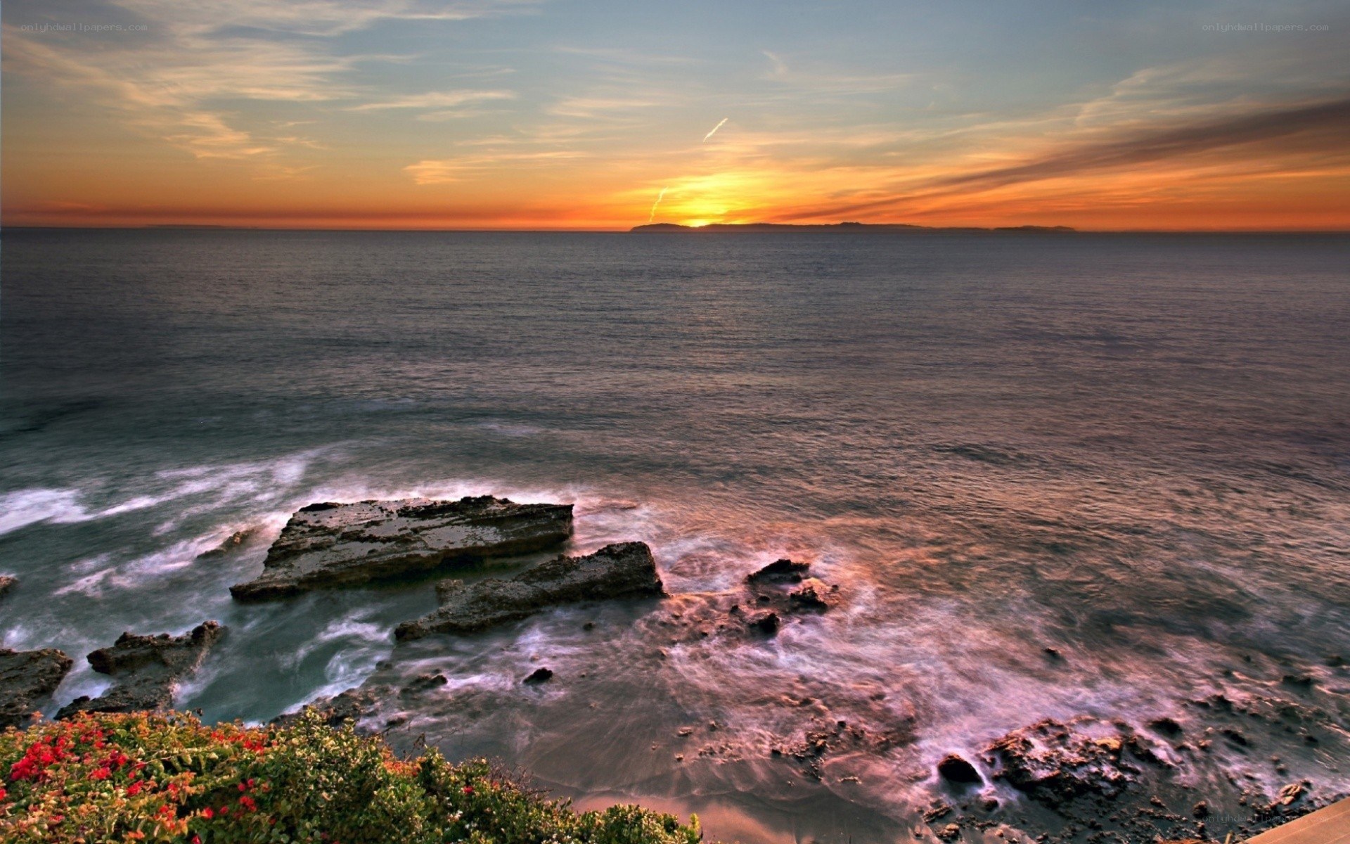 Sunset over coastal rocks