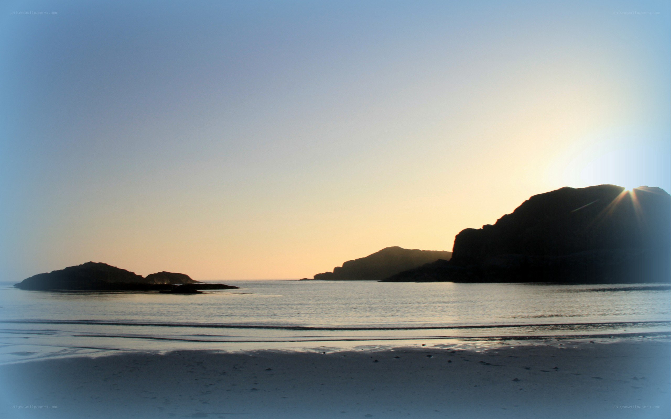 Sunset over coastal rocks