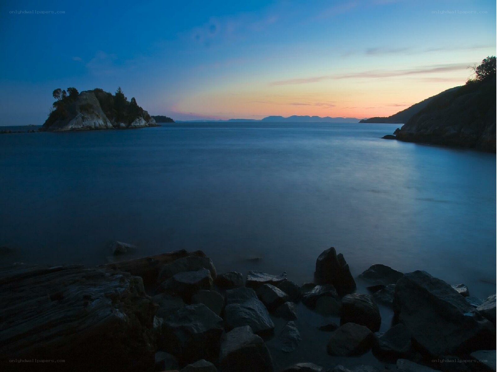 Sunset over coastal rocks