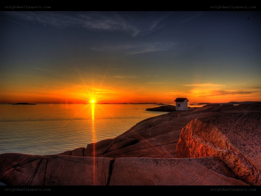 Sunset over coastal rocks