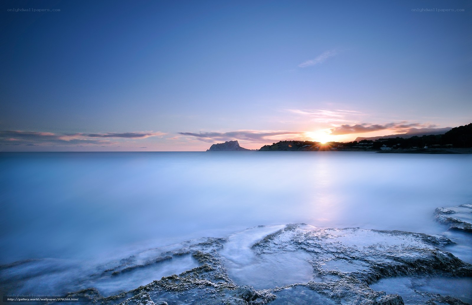 Sunset over coastal rocks