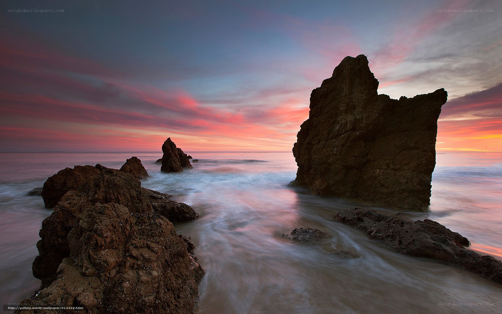 Sunset over coastal rocks