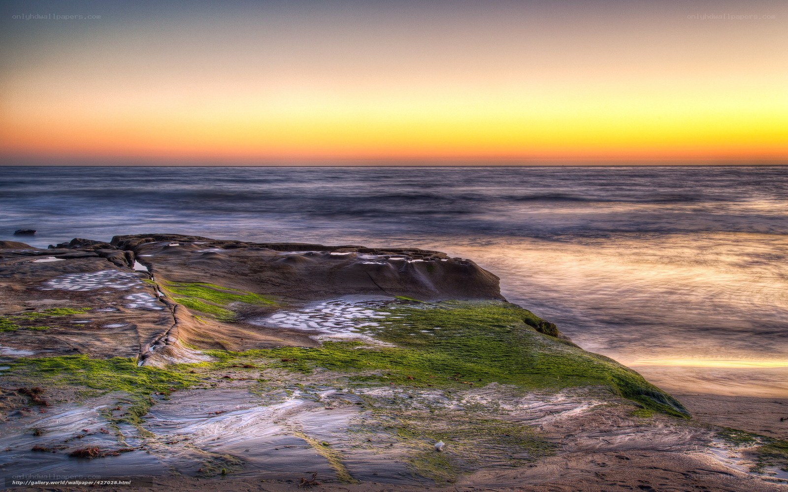 Sunset over coastal rocks
