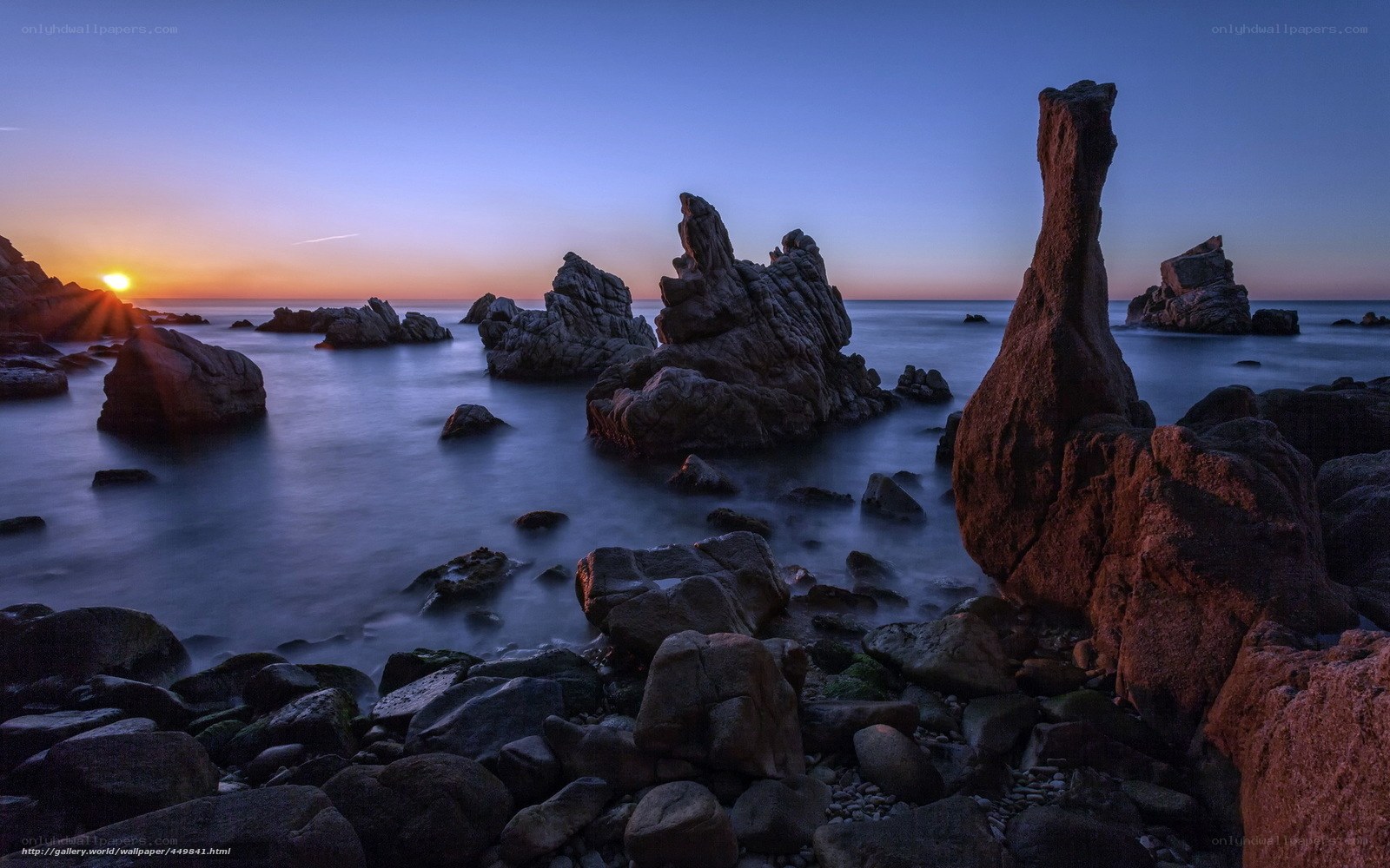 Sunset over coastal rocks