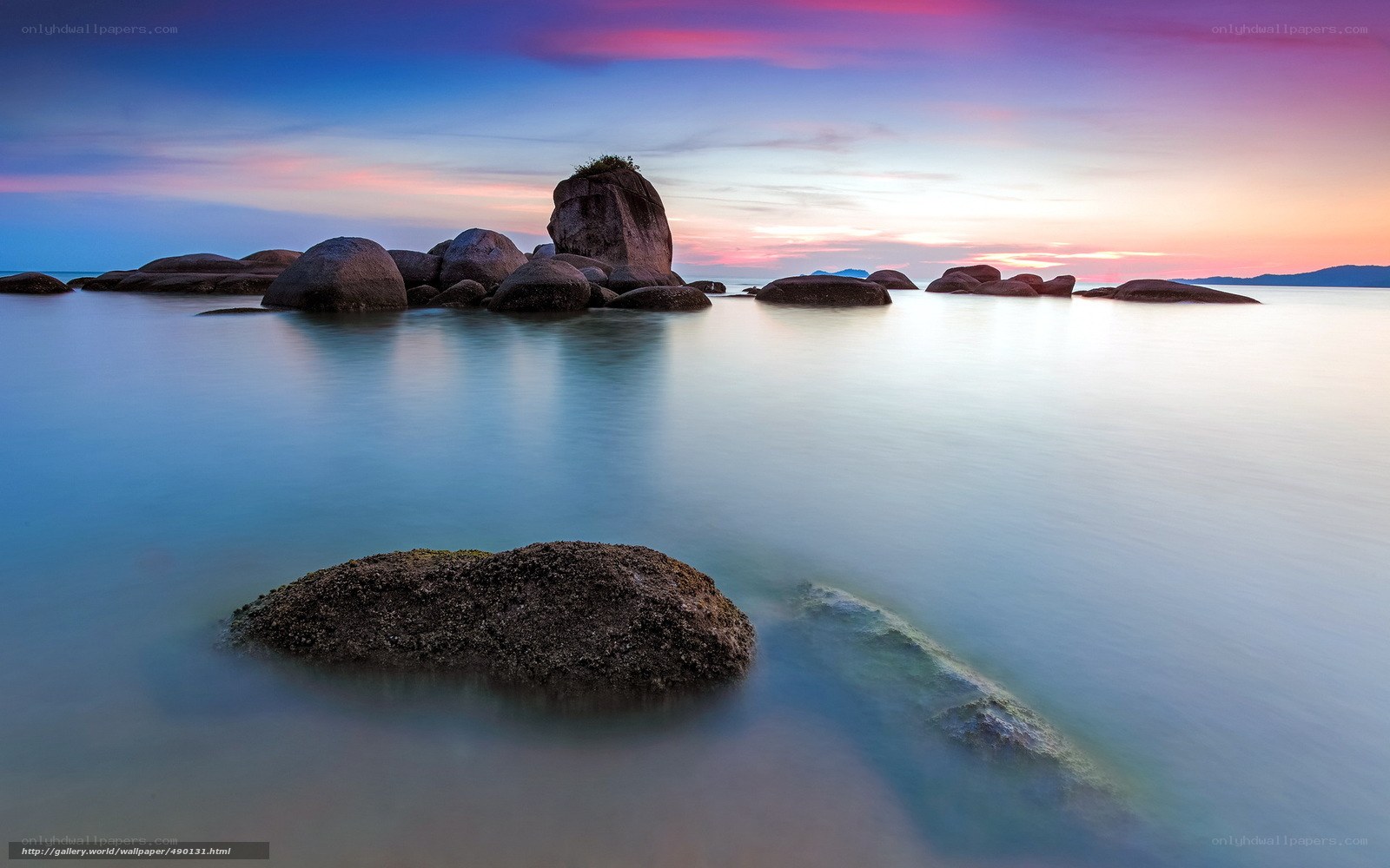 Sunset over coastal rocks