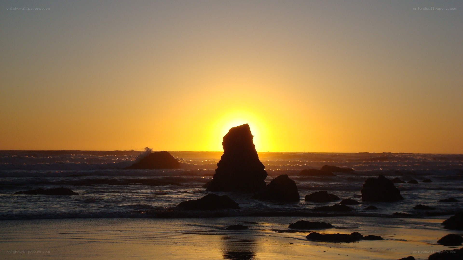 Sunset over coastal rocks