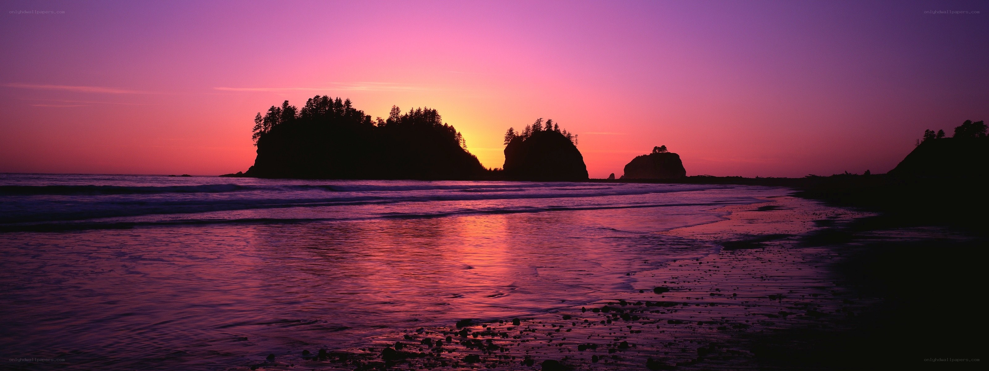 sunset over coastal rocks