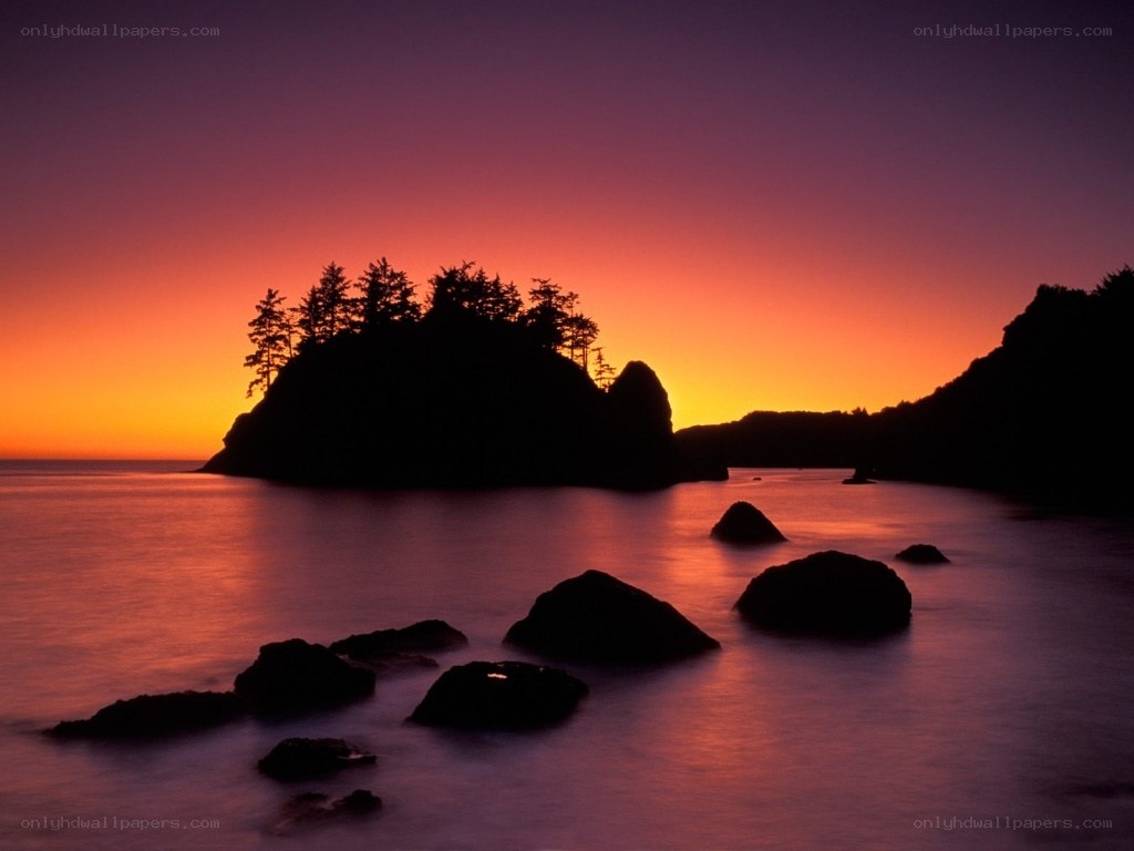 Sunset over coastal rocks