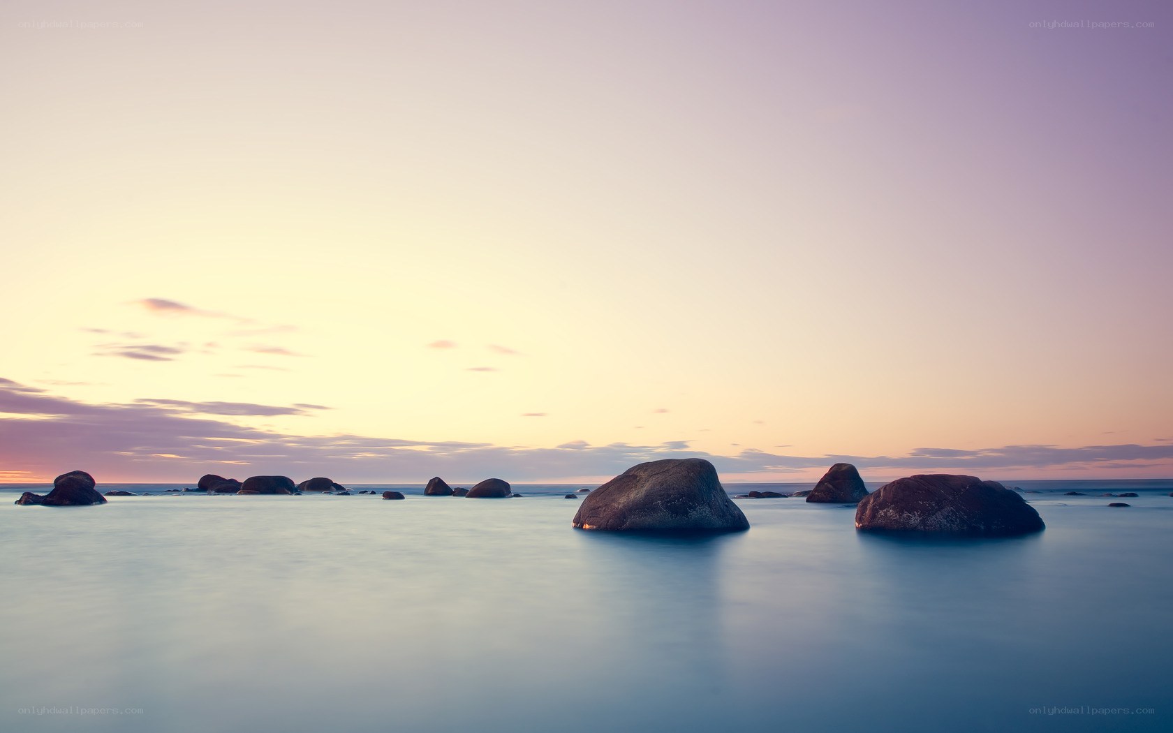 Sunset over coastal rocks