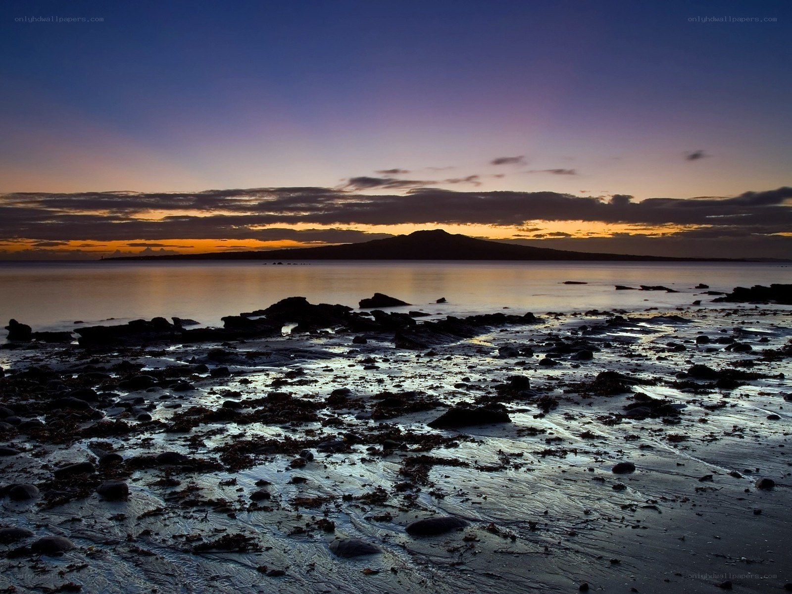 Sunset over coastal rocks