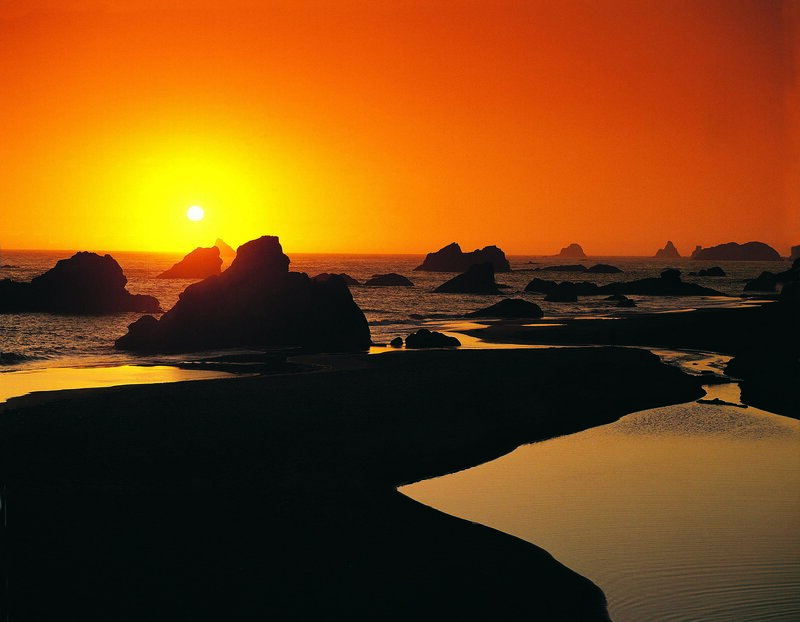 Sunset over coastal rocks