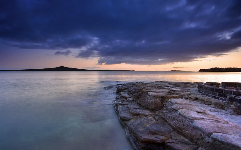Sunset over coastal rocks
