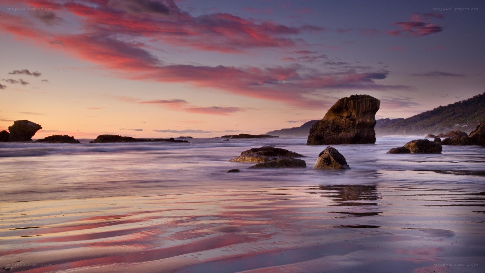 Sunset over coastal rocks