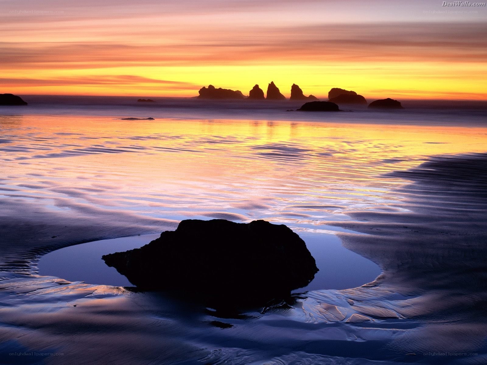 Sunset over coastal rocks