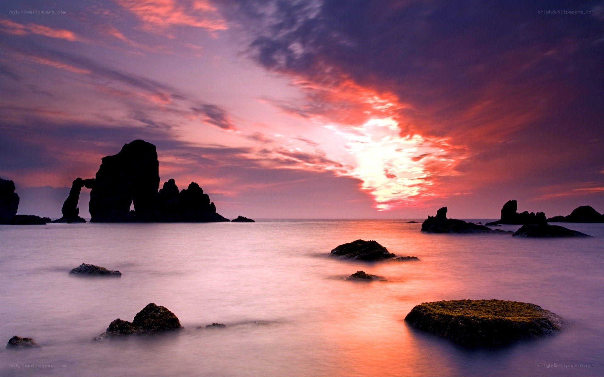 Sunset over coastal rocks