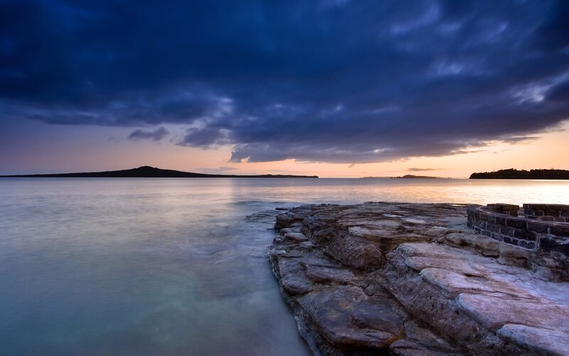 Sunset over coastal rocks