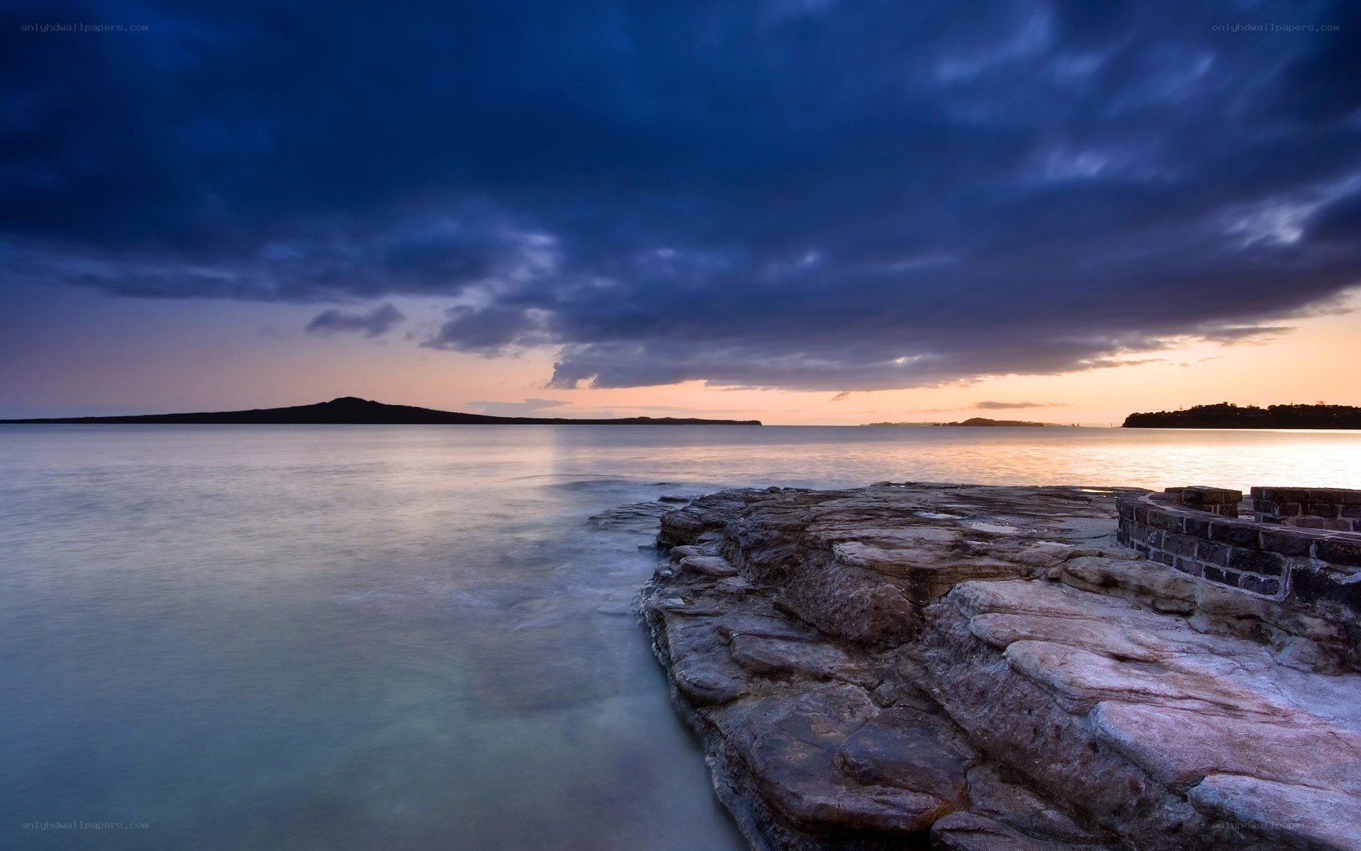 Sunset over coastal rocks