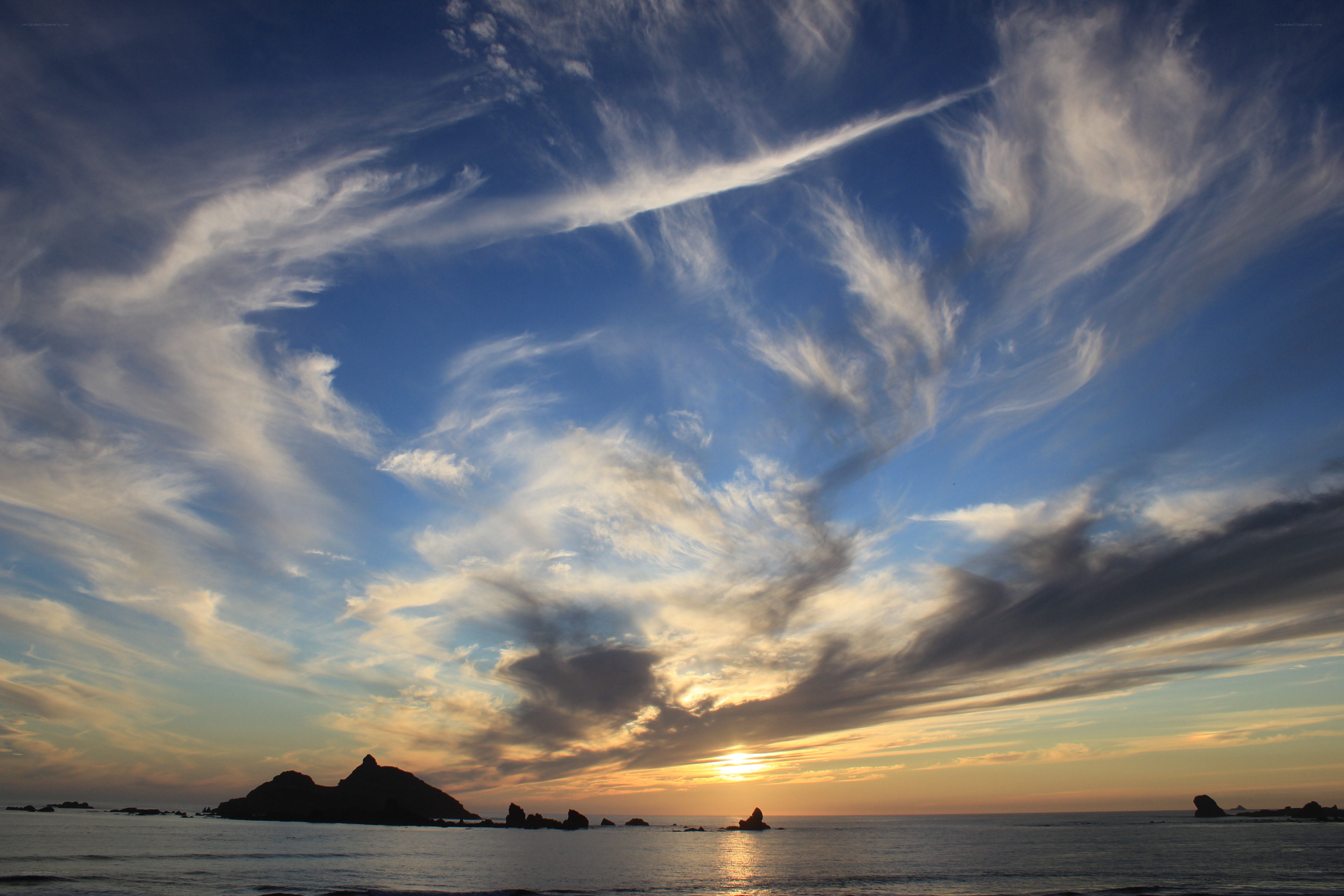 Sunset over coastal rocks