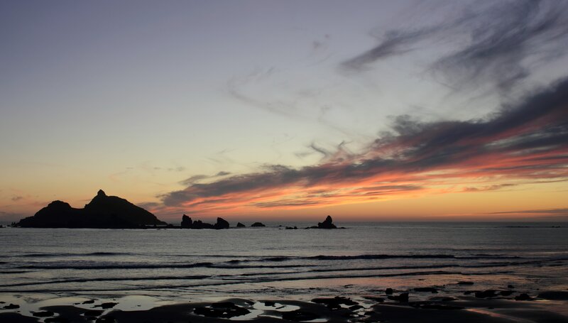 sunset over coastal rocks