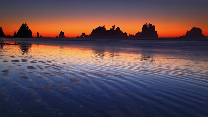 Sunset over coastal rocks