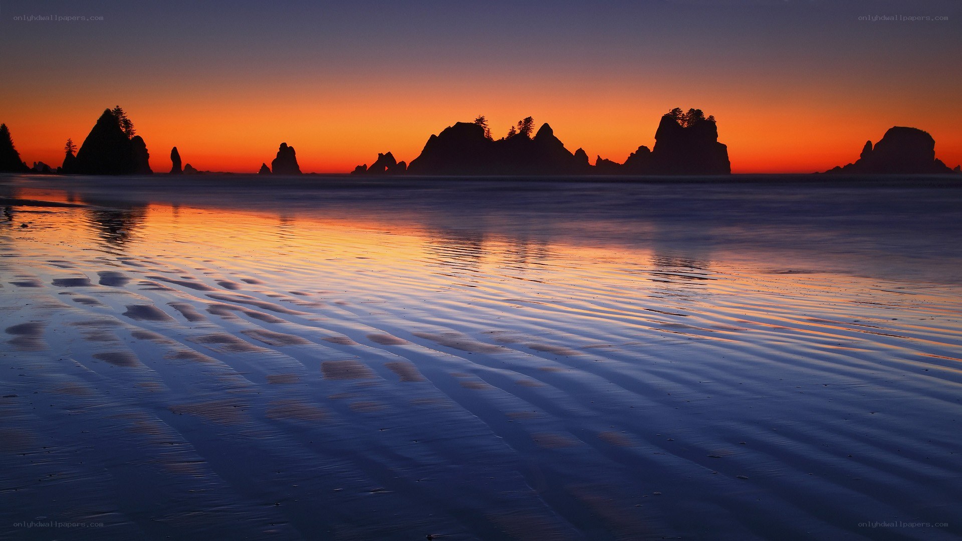Sunset over coastal rocks