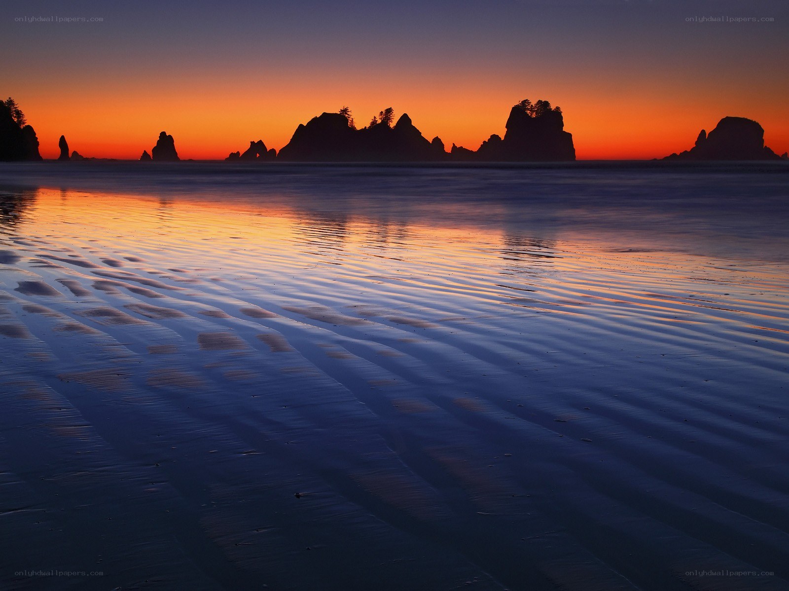 Sunset over coastal rocks