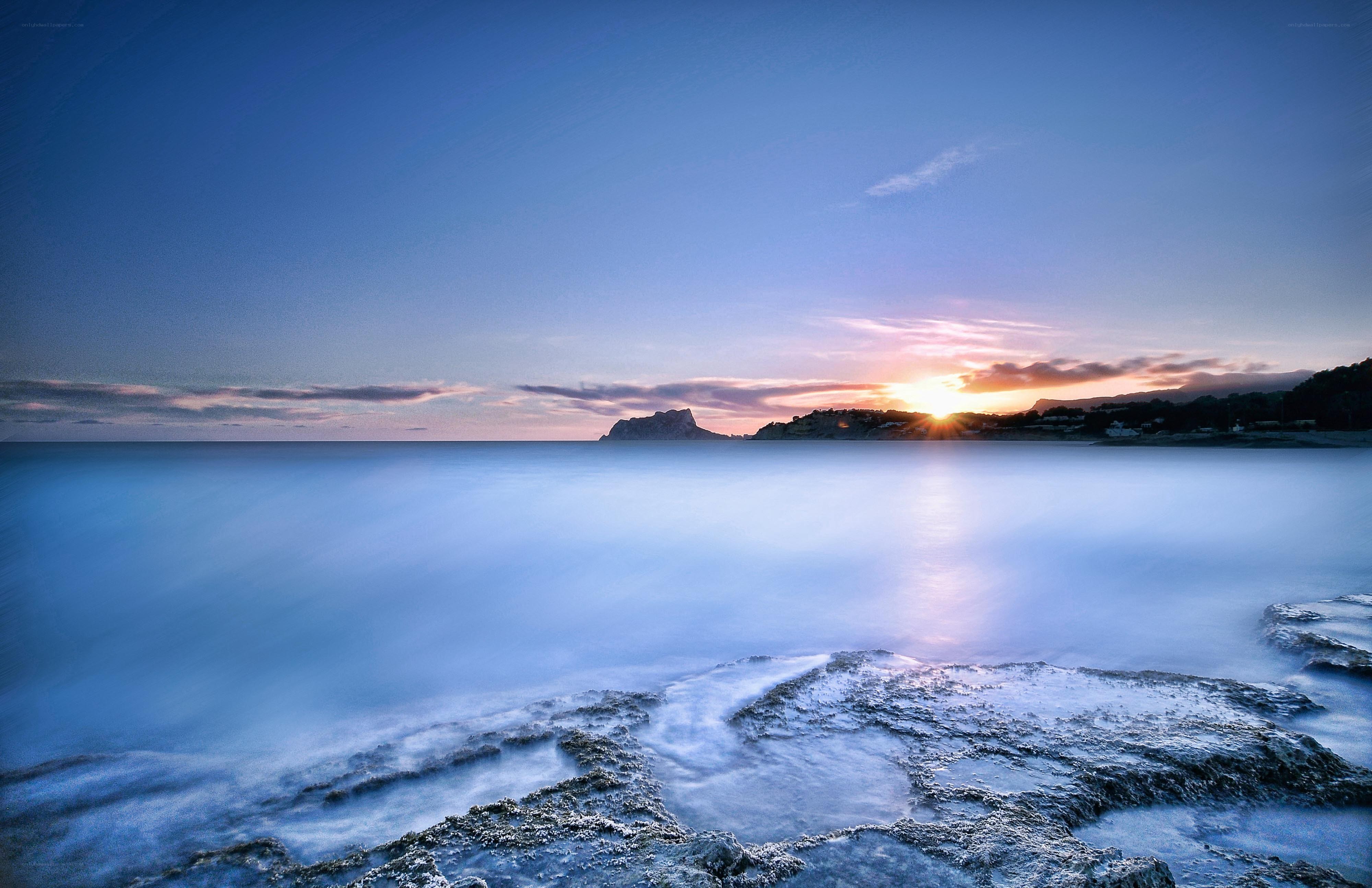 Sunset over coastal rocks