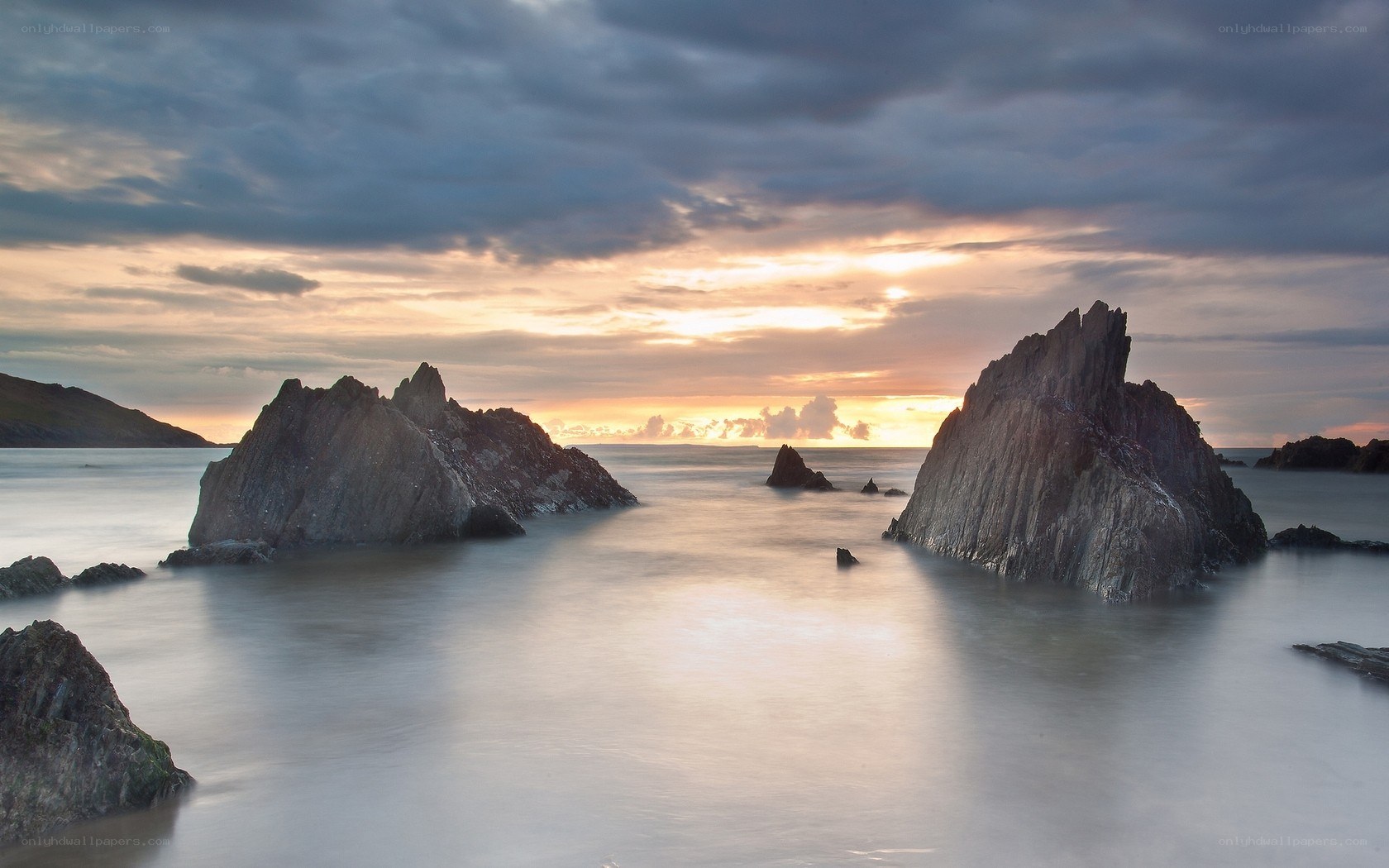 Sunset over coastal rocks