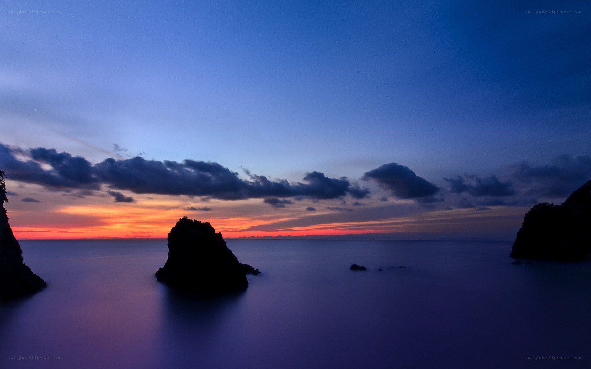 Sunset over coastal rocks
