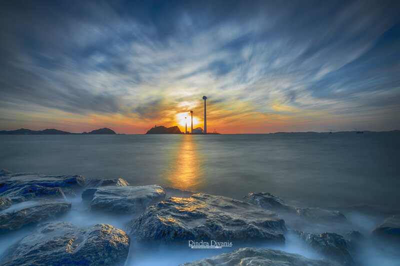 Sunset over Coastal Rocks — Blue