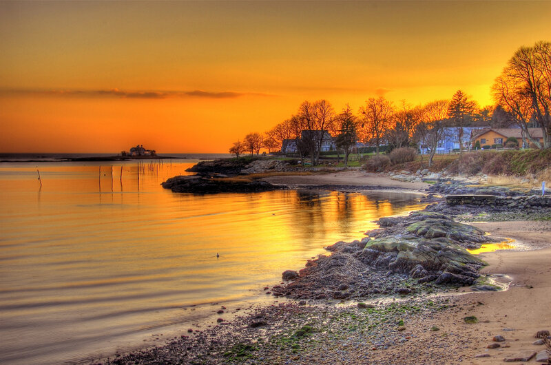 Sunset over Coastal Shore — Orange