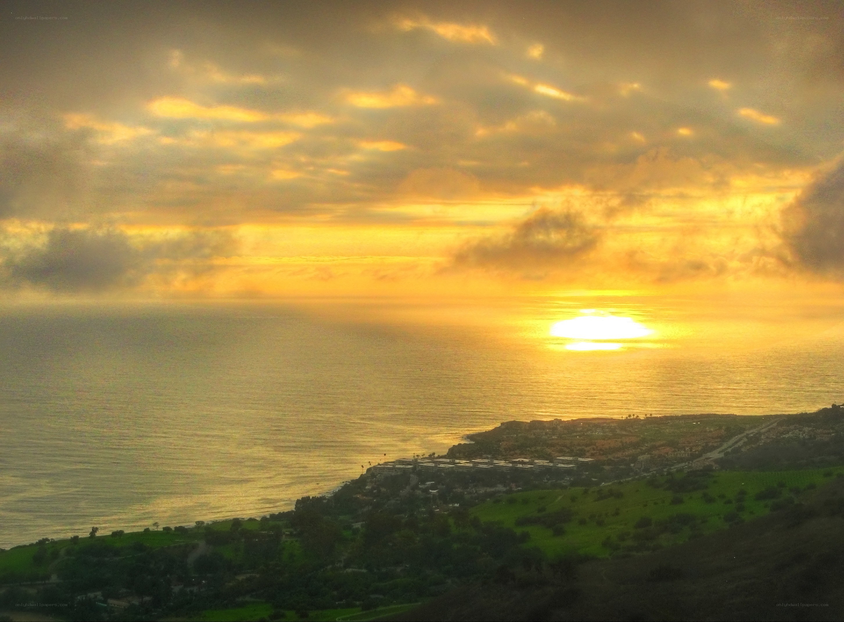 sunset over coastal town