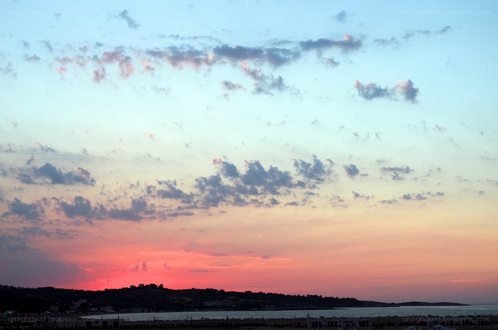sunset over coastal town