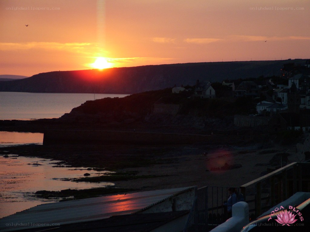 sunset over coastal town