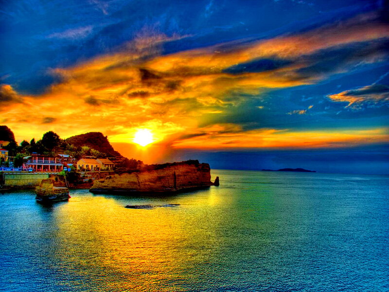 Sunset over Coastal Town — Blue, Dramatic