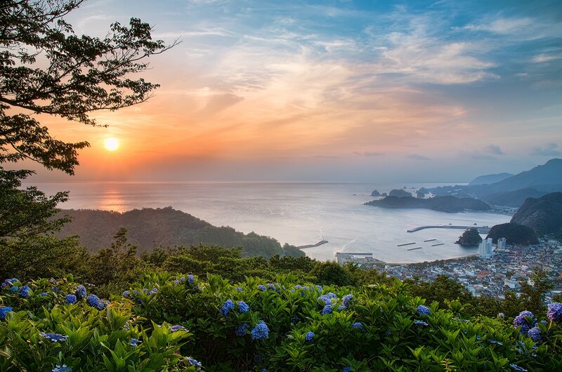 Sunset over Coastal Town — Blue, Serene, Photograph, Ocean