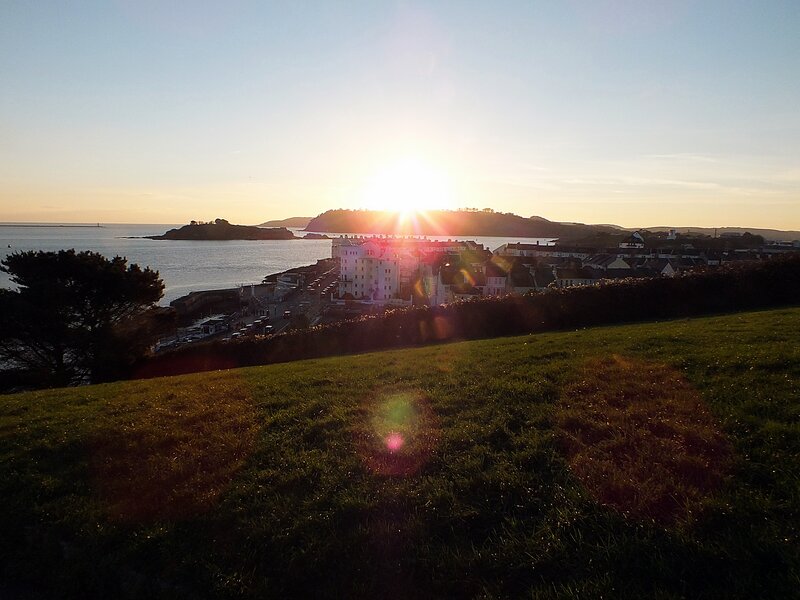 Sunset over Coastal Town — Green