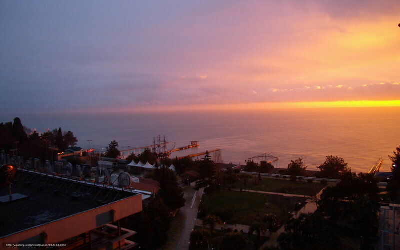 Sunset over Coastal Town — Orange, Serene, Photograph, Ocean, Pier