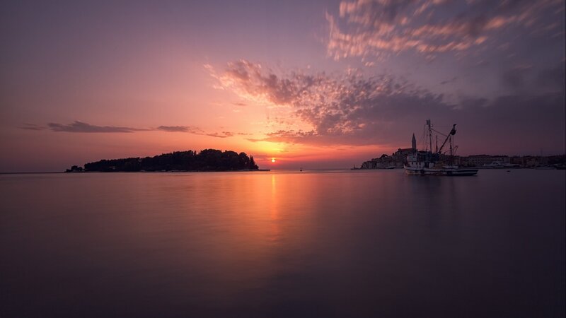 Sunset over Coastal Town — Purple