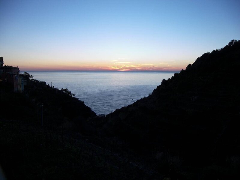 Sunset over Coastal Village — Blue