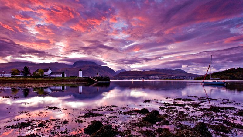Sunset over Coastal Village — Purple