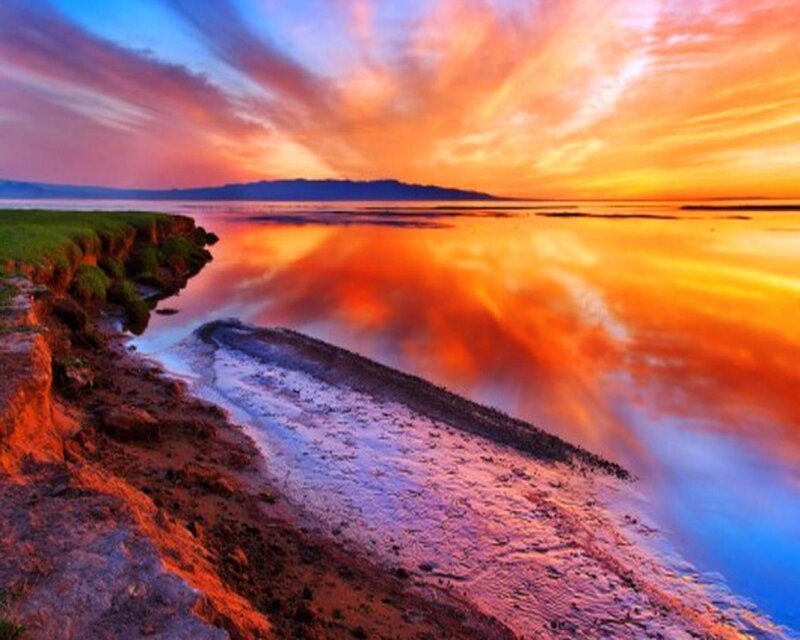 Sunset over Coastal Water — Orange, Dramatic, Photograph, Sky