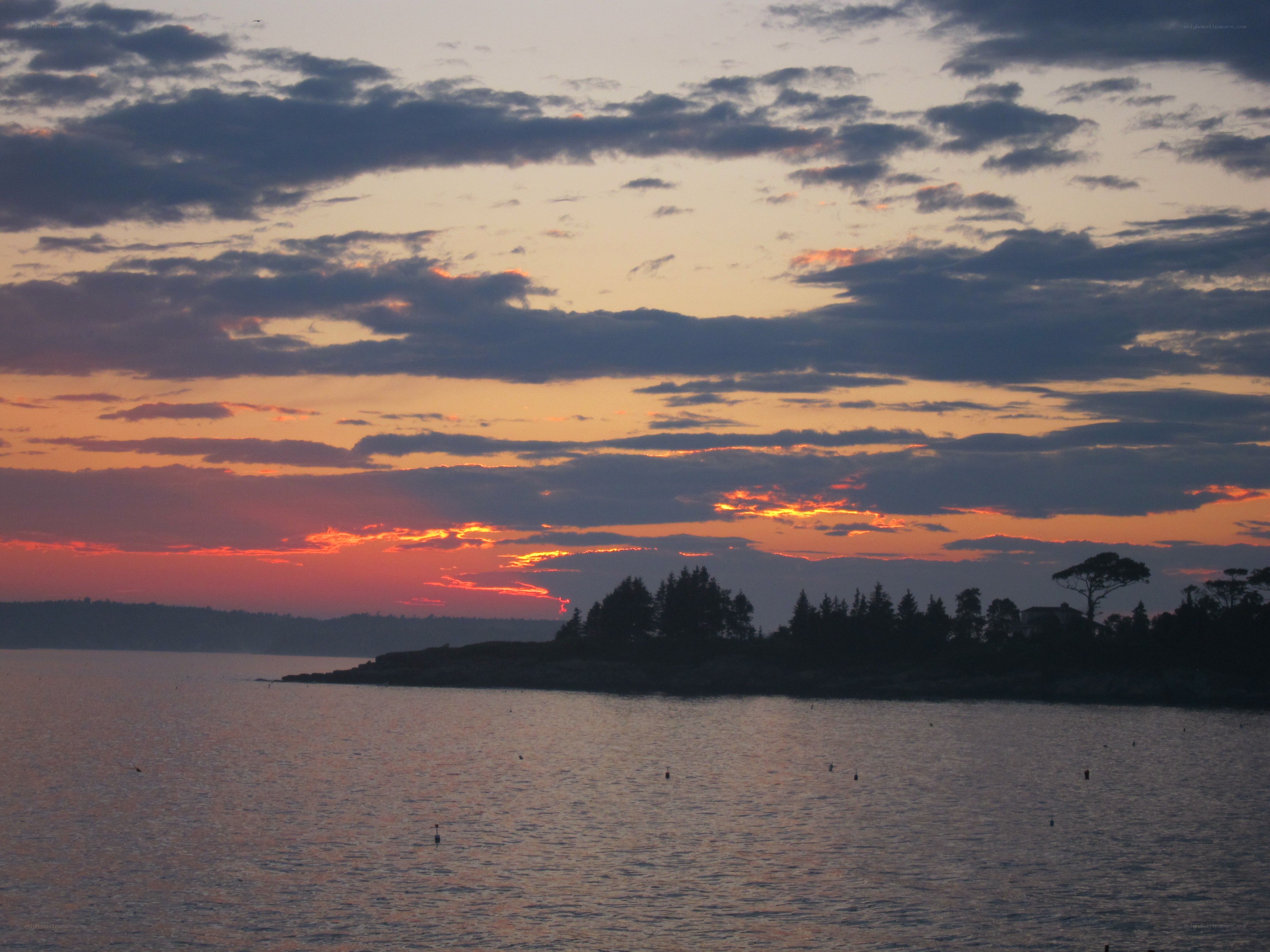 sunset over coastal waters