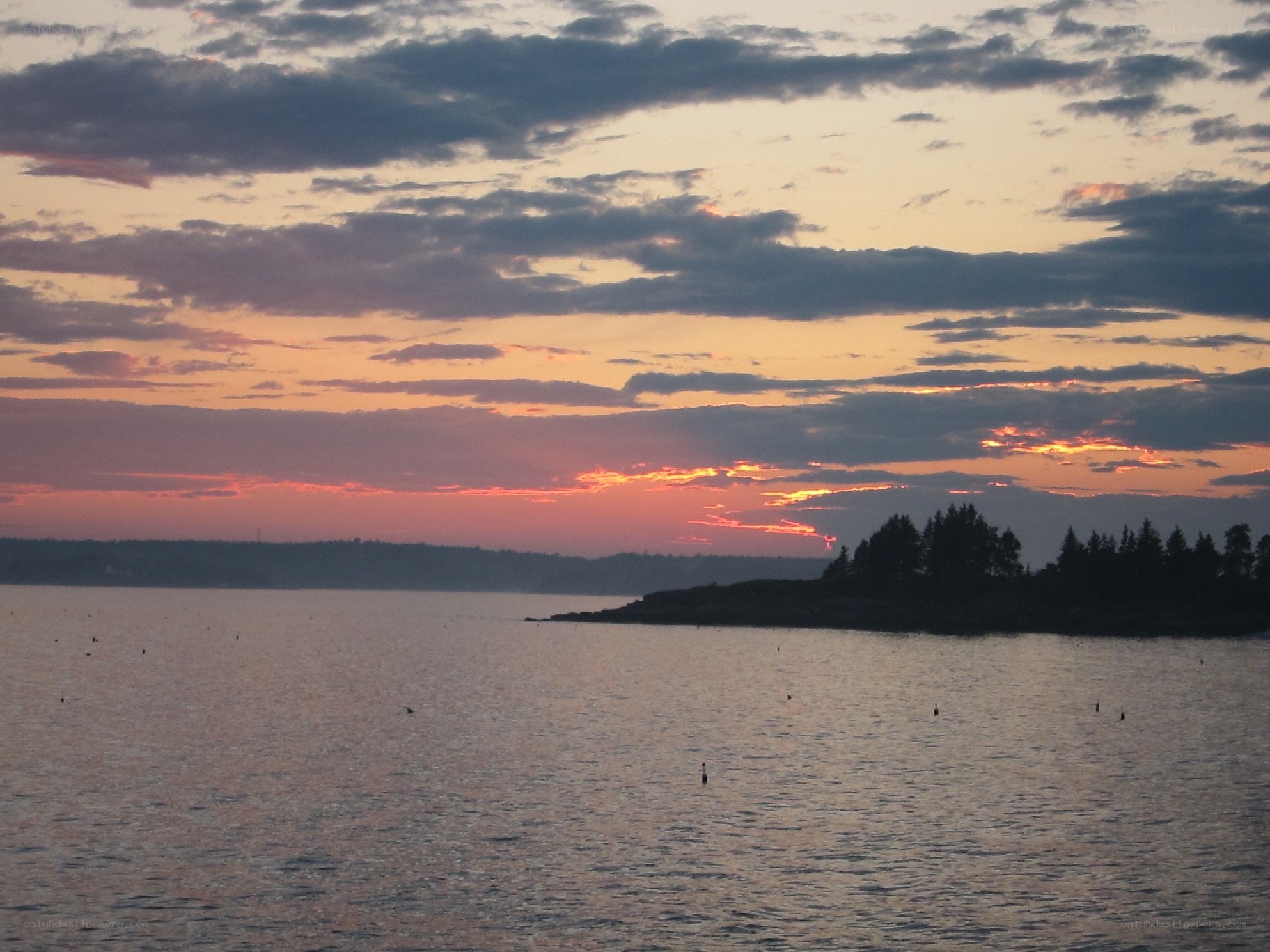 sunset over coastal waters