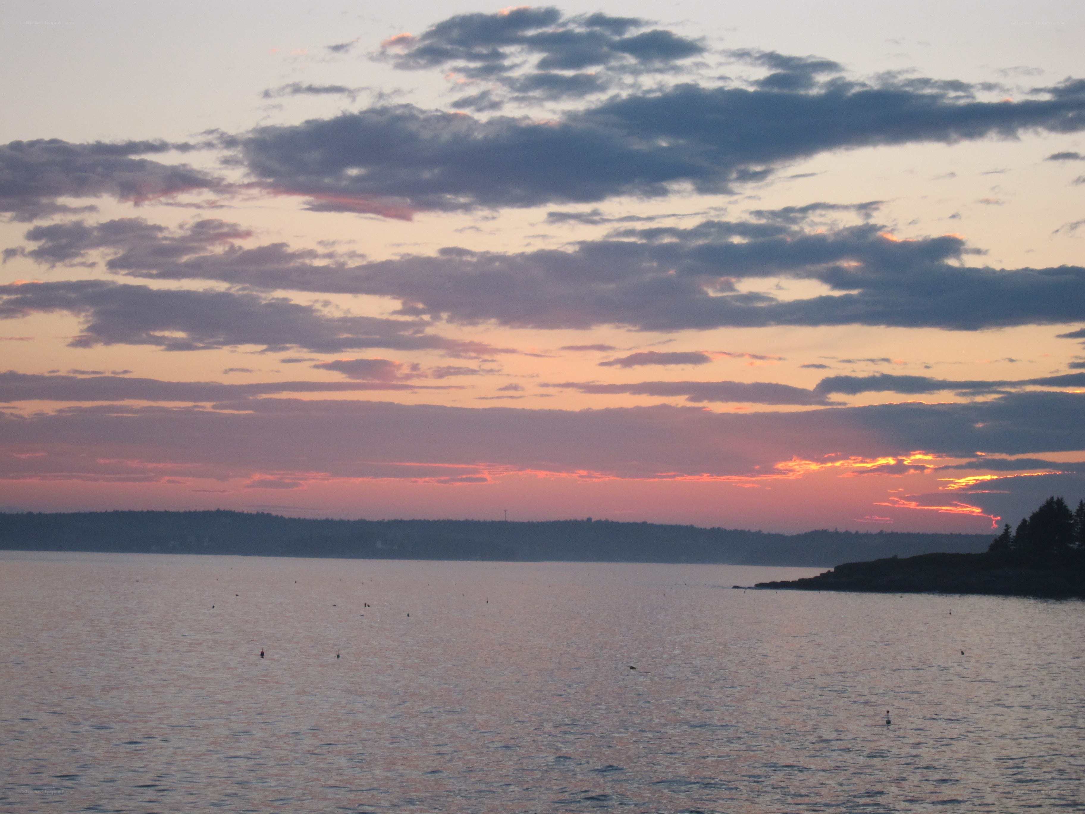 sunset over coastal waters