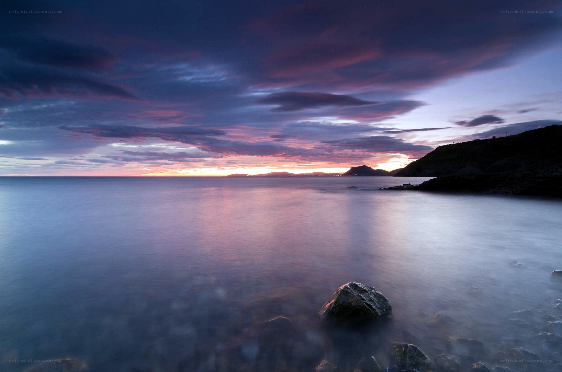Sunset over coastal waters